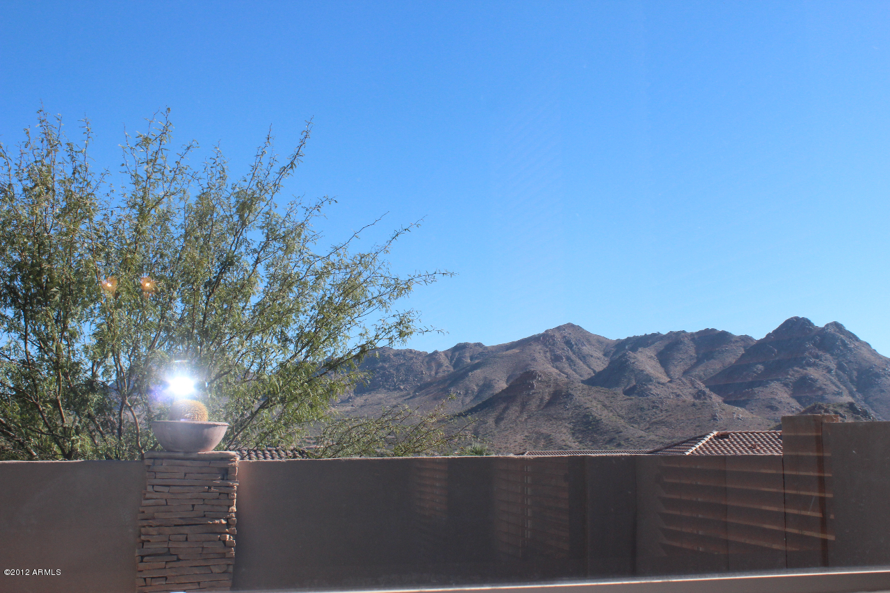 11517 East Ranch Gate Road Scottsdale, AZ 85255 - Photo 31 of 35 a view of a house with a mountain
