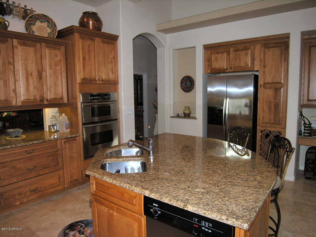11517 East Ranch Gate Road Scottsdale, AZ 85255 - Photo 35 of 35 a kitchen with stainless steel appliances granite countertop a sink a stove and refrigerator