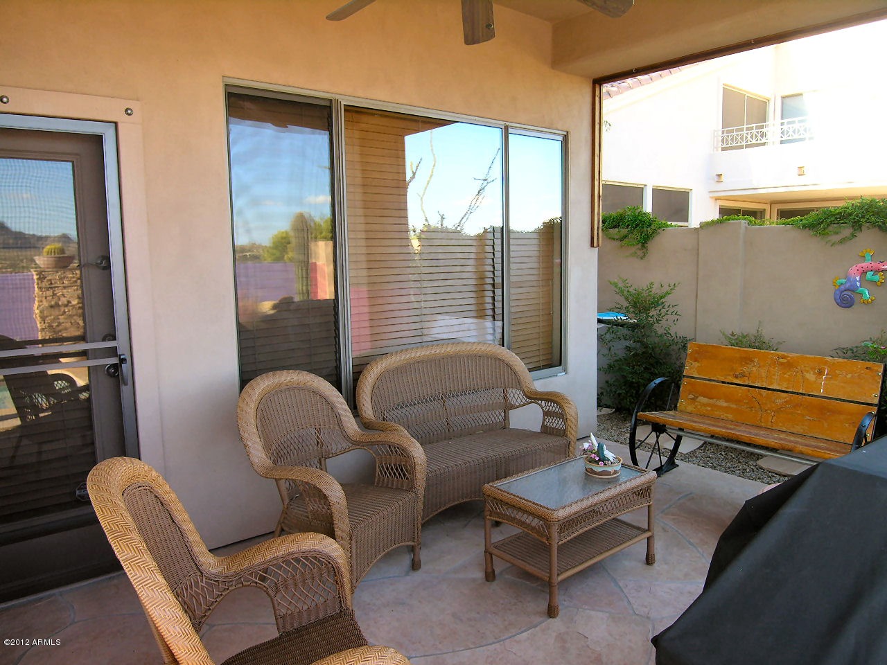 11517 East Ranch Gate Road Scottsdale, AZ 85255 - Photo 8 of 35 a living room with furniture and a window