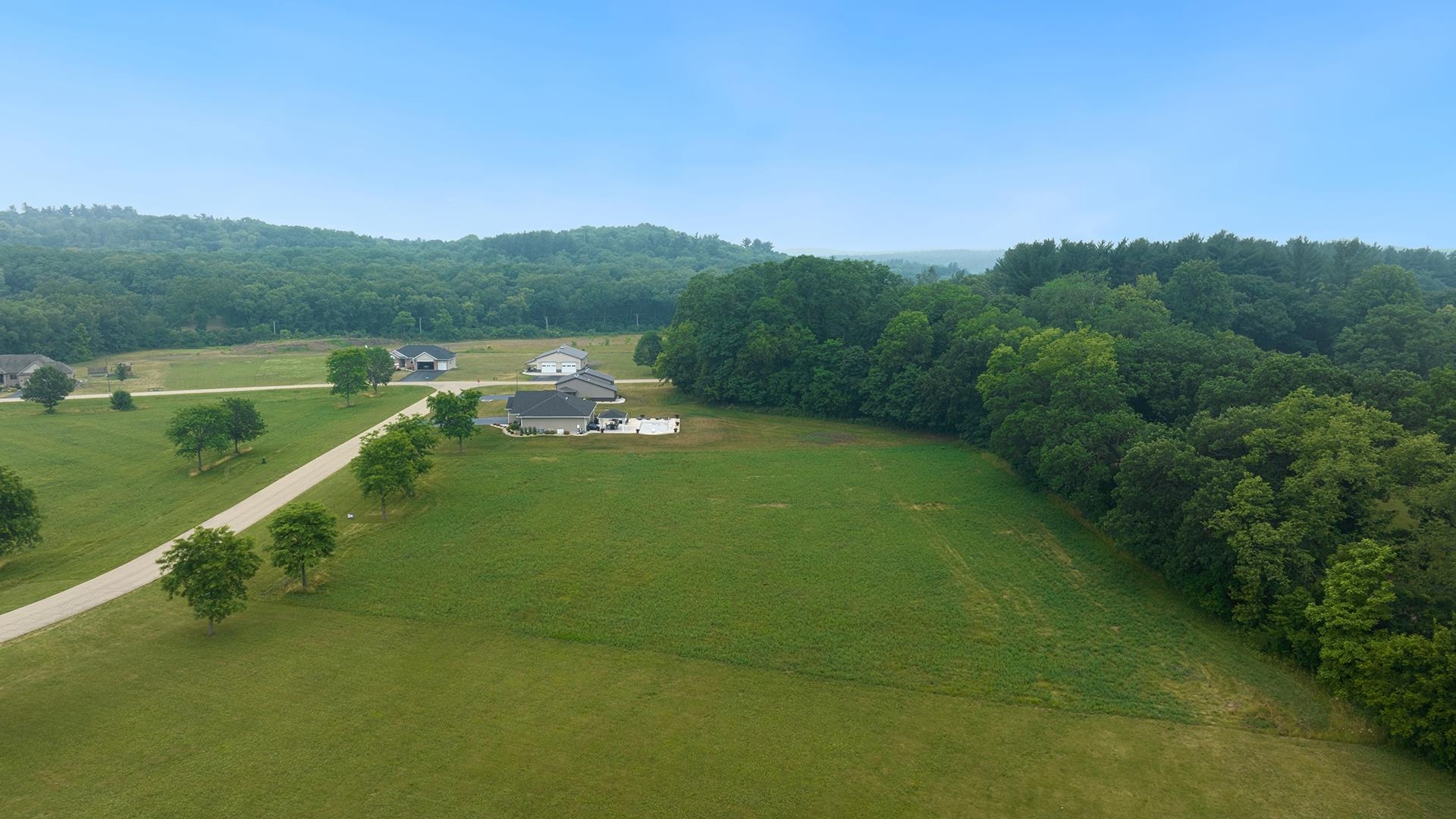 0 Austin Court Oregon, IL 61061 - Photo 2 of 14 a view of a lake with a yard