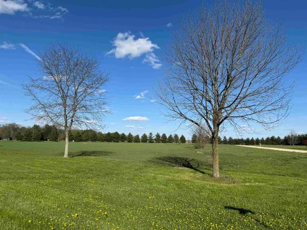 a view of an outdoor space and a yard