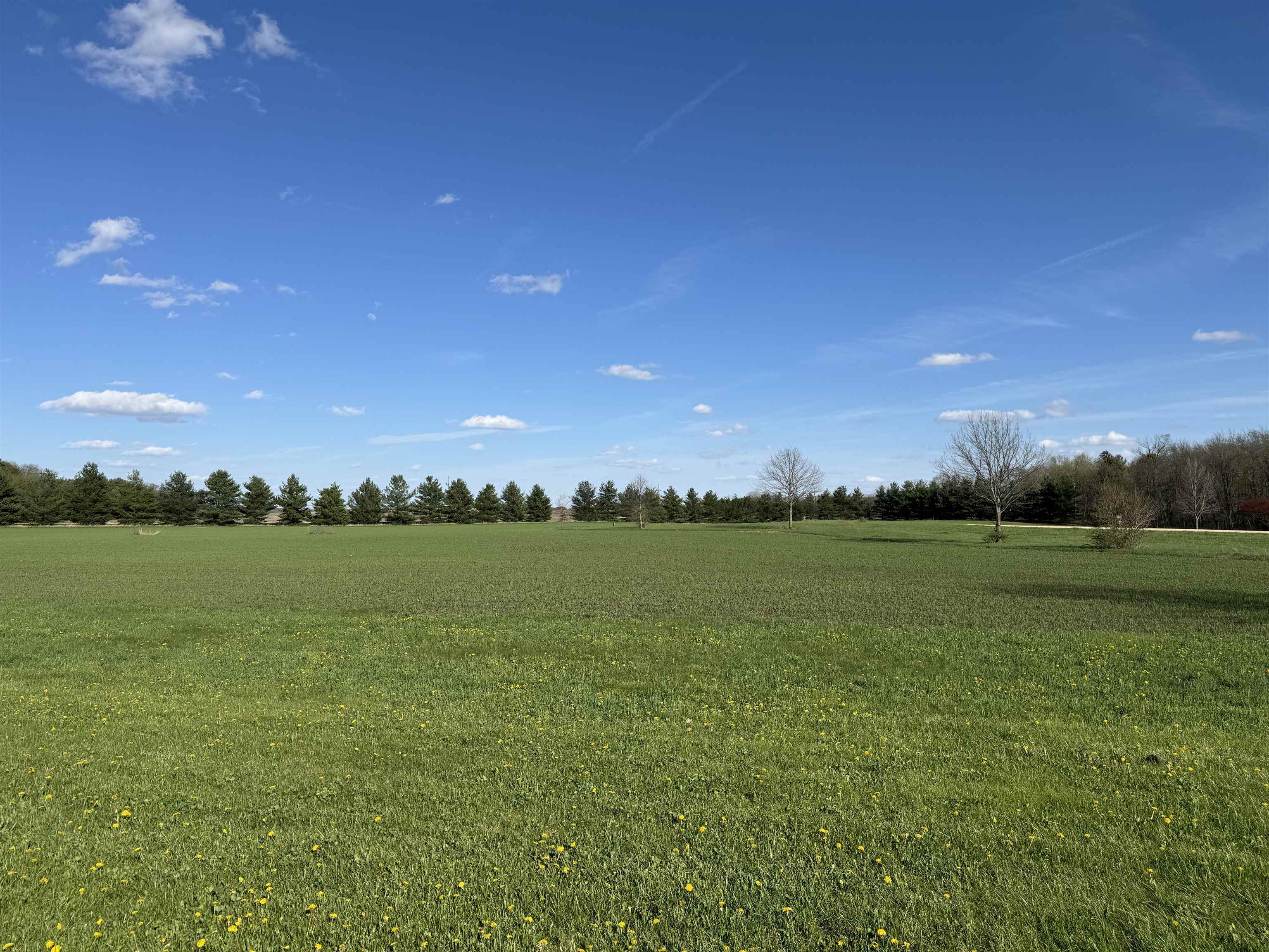 0 Austin Court Oregon, IL 61061 - Photo 6 of 14 a view of a lake from a yard