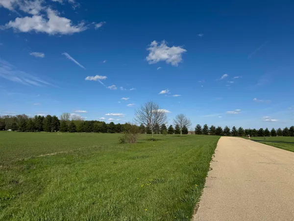 a view of a golf course with a lake