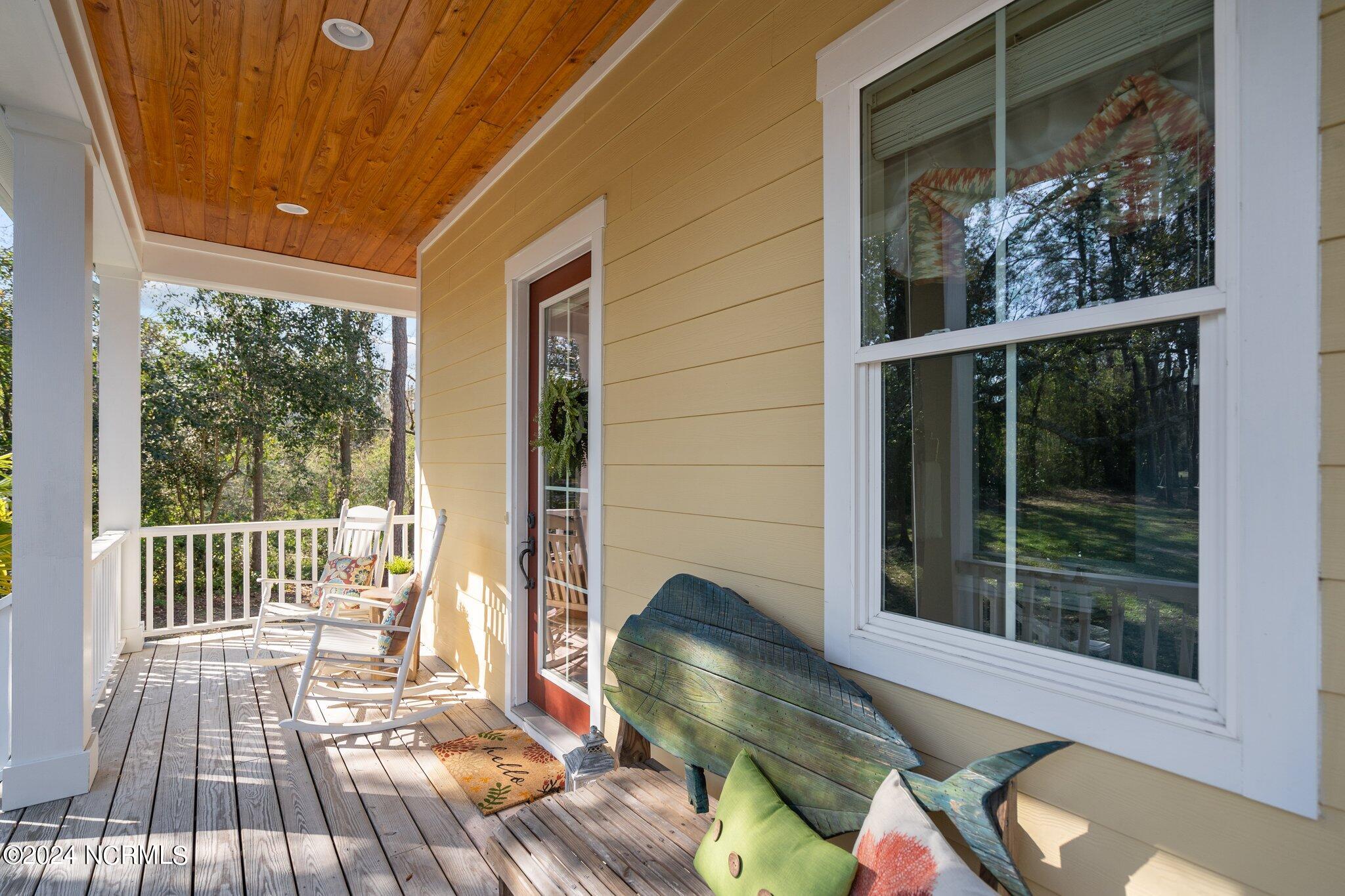435 Trails End Road Wilmington, NC 28409 - Photo 10 of 93 Wrap around porch with tongue in groove ceilings