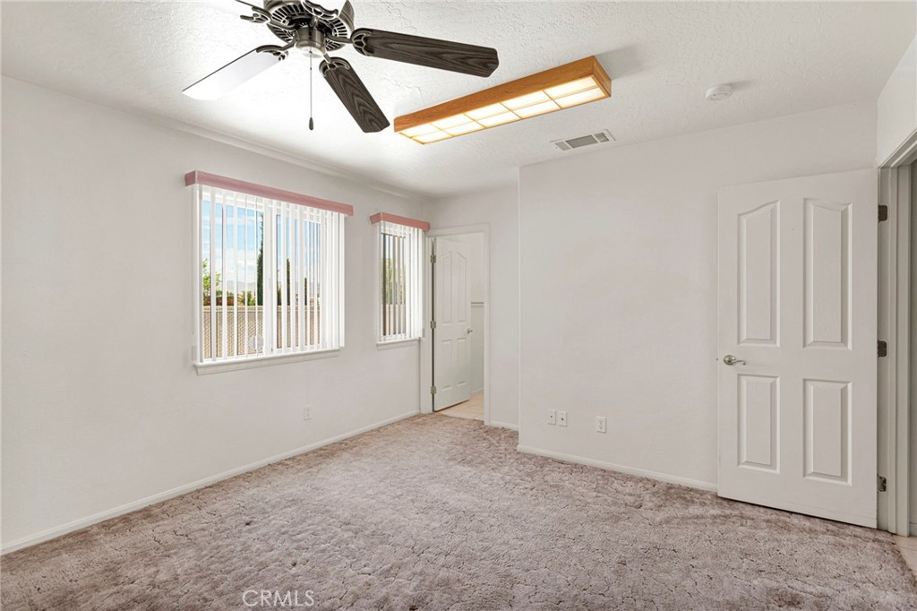 11281 4th Hesperia, CA 92345 - Photo 22 of 35 Large primary bedroom with big windows