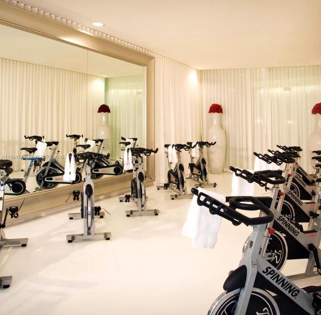 475 Brickell Avenue, Unit 3514 Miami, FL 33131 - Photo 14 of 16 a view of a room with gym equipment
