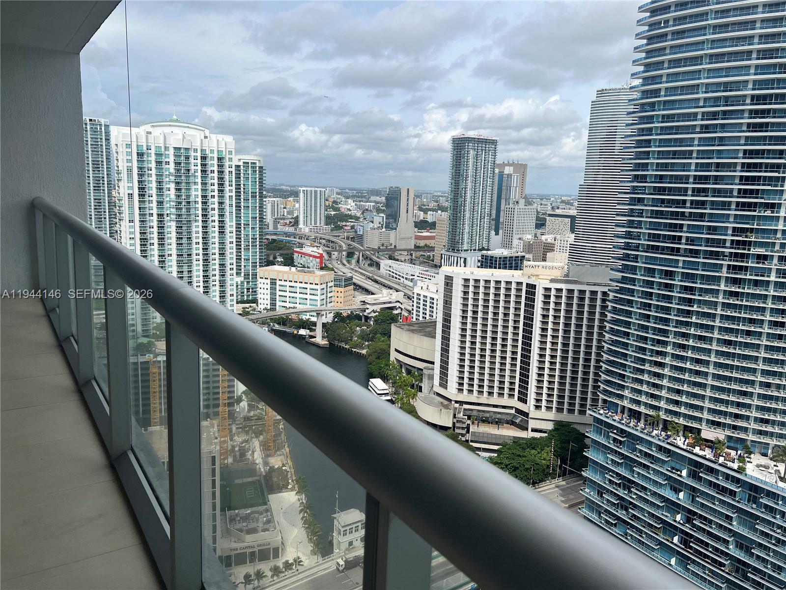 475 Brickell Avenue, Unit 3514 Miami, FL 33131 - Photo 10 of 16 a view of city from a balcony