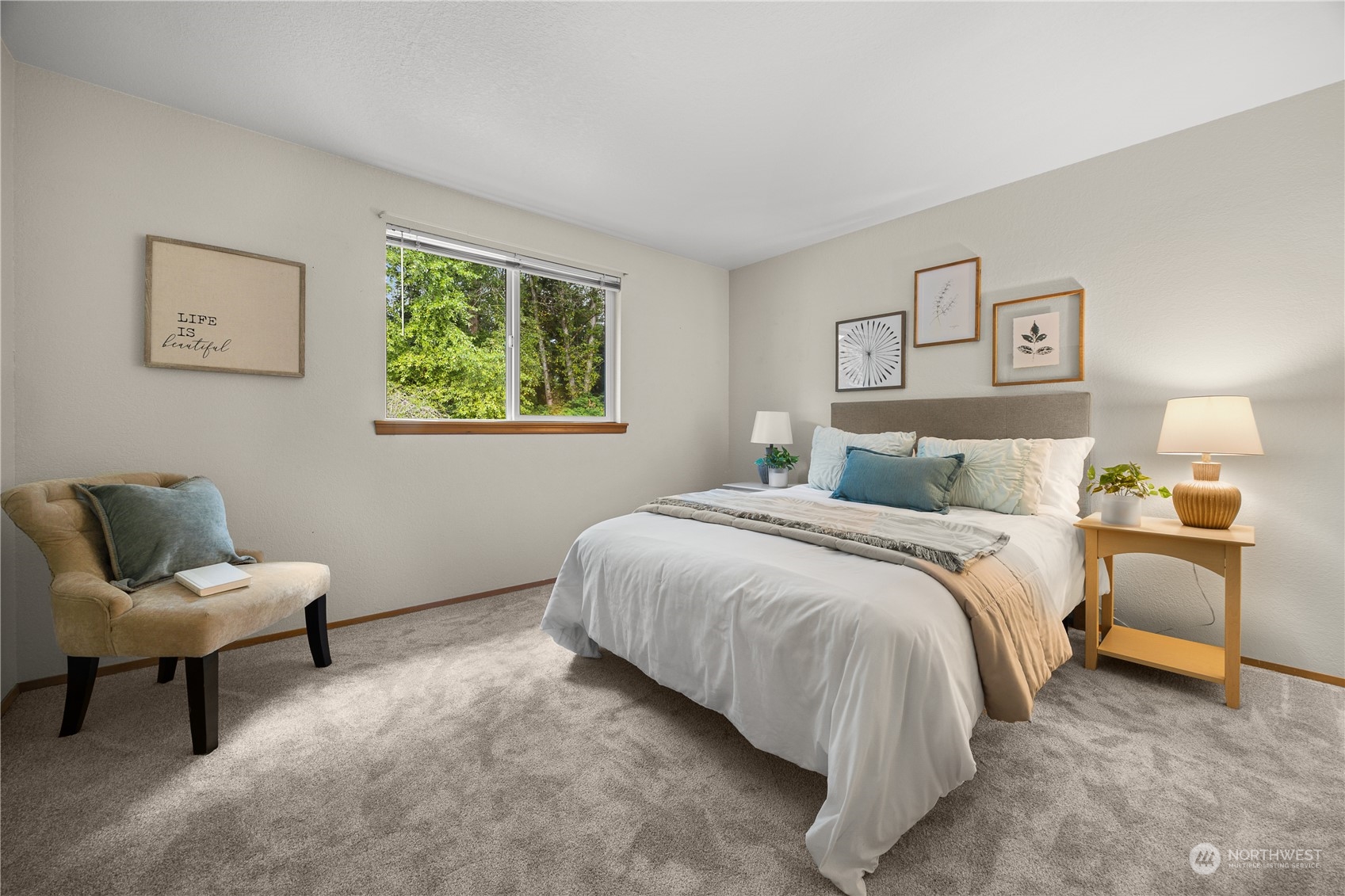 23323 12th Place West Bothell, WA 98021 - Photo 15 of 36 a bedroom with a bed and chair