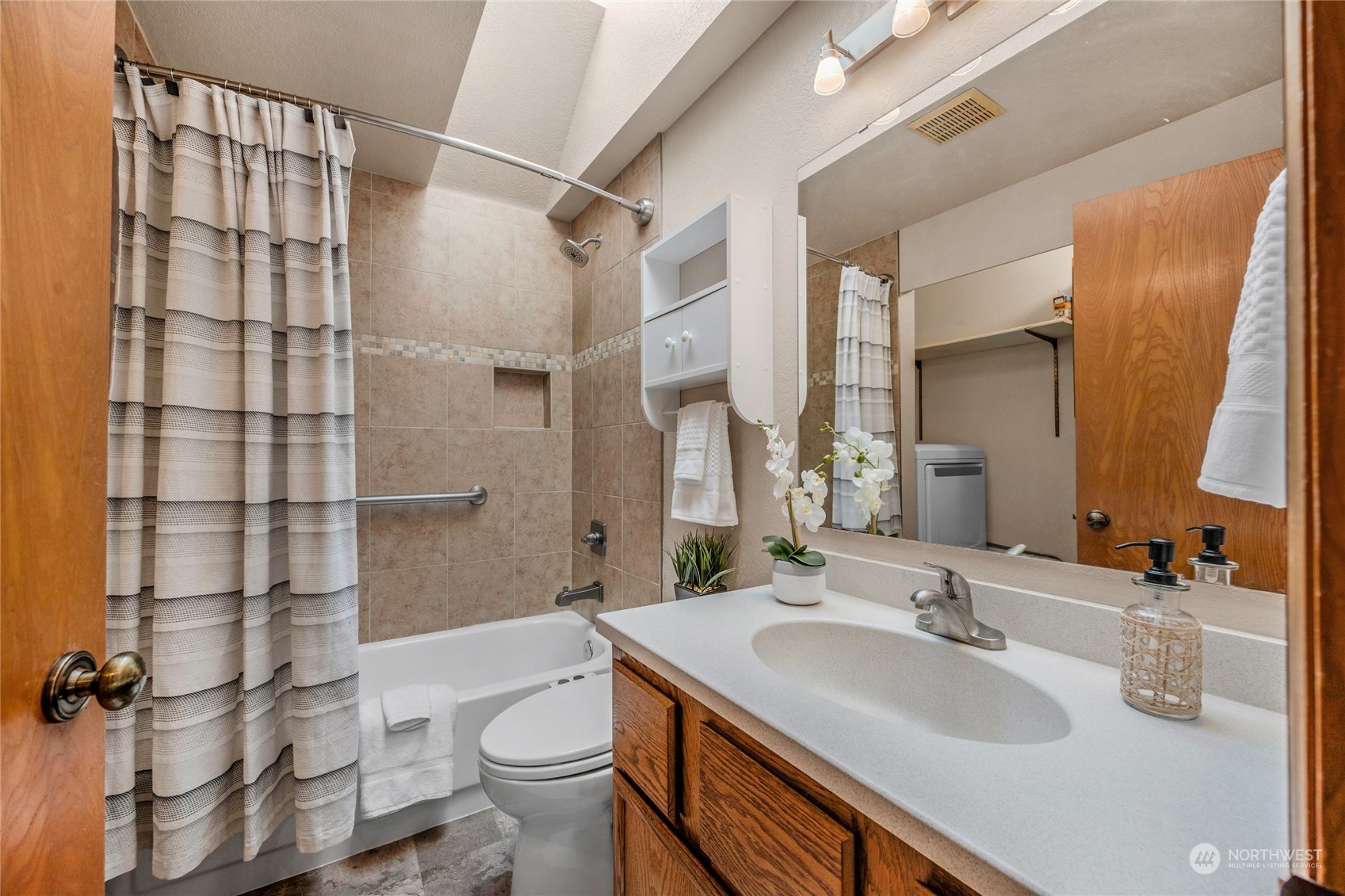 23323 12th Place West Bothell, WA 98021 - Photo 19 of 36 a bathroom with a sink toilet tub and shower