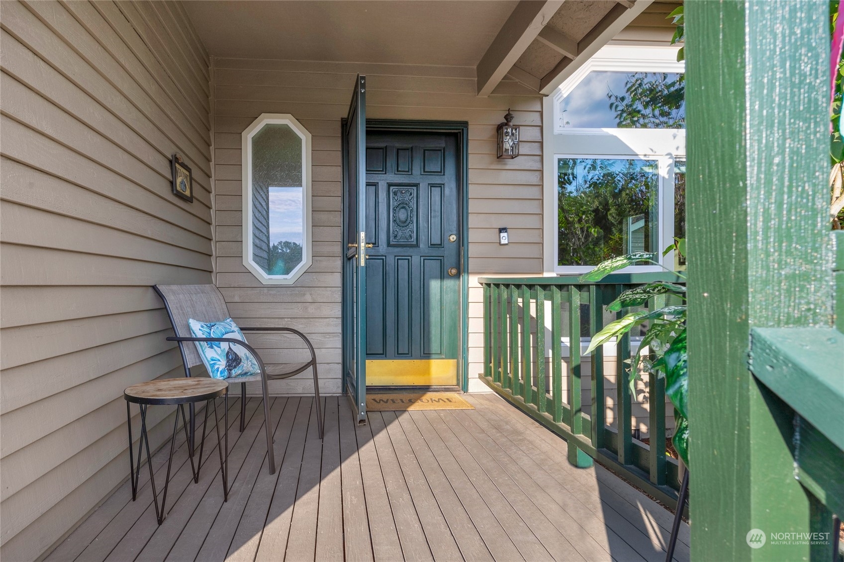 23323 12th Place West Bothell, WA 98021 - Photo 2 of 36 a view of a balcony with wooden floor
