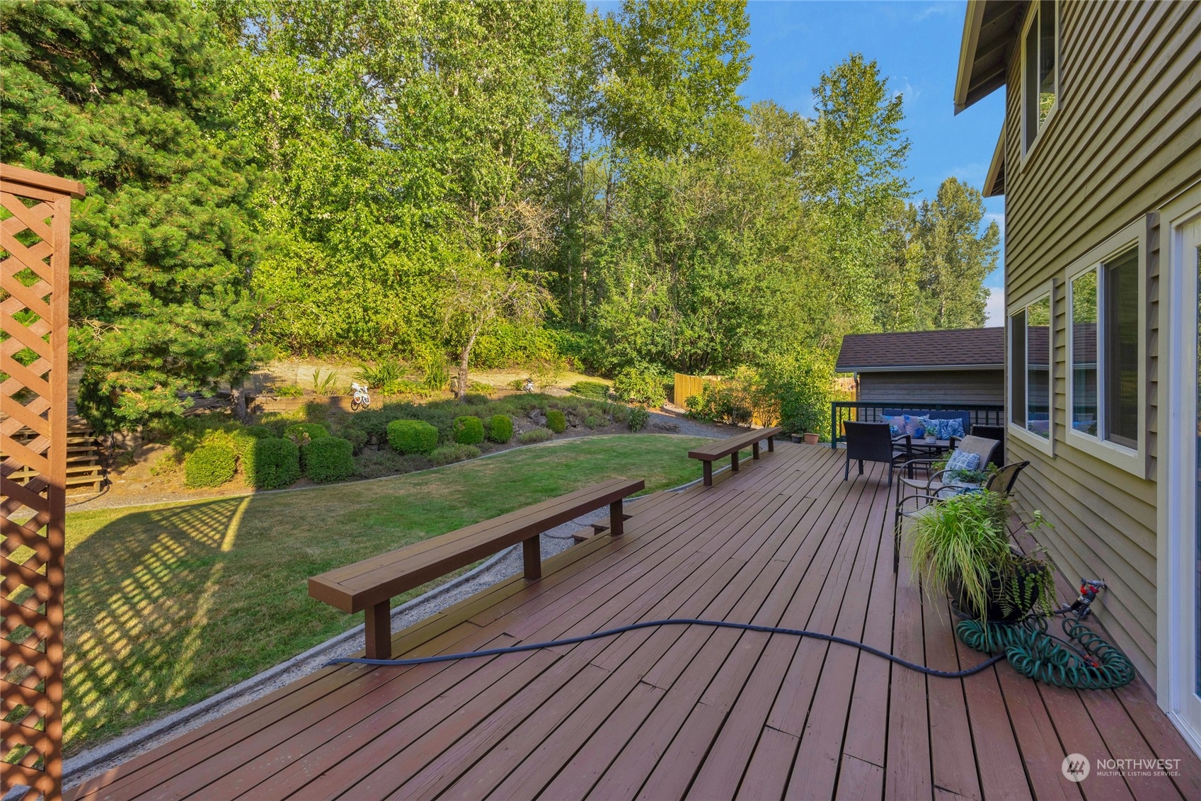 23323 12th Place West Bothell, WA 98021 - Photo 21 of 36 a view of a deck with wooden floor and outdoor seating