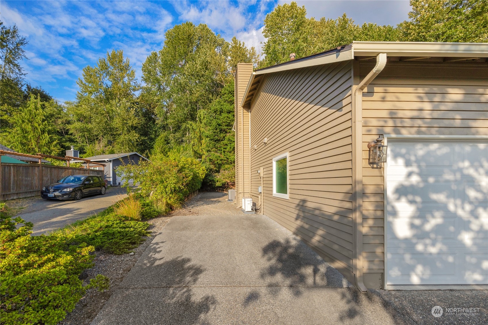 23323 12th Place West Bothell, WA 98021 - Photo 25 of 36 a view of a back yard of the house