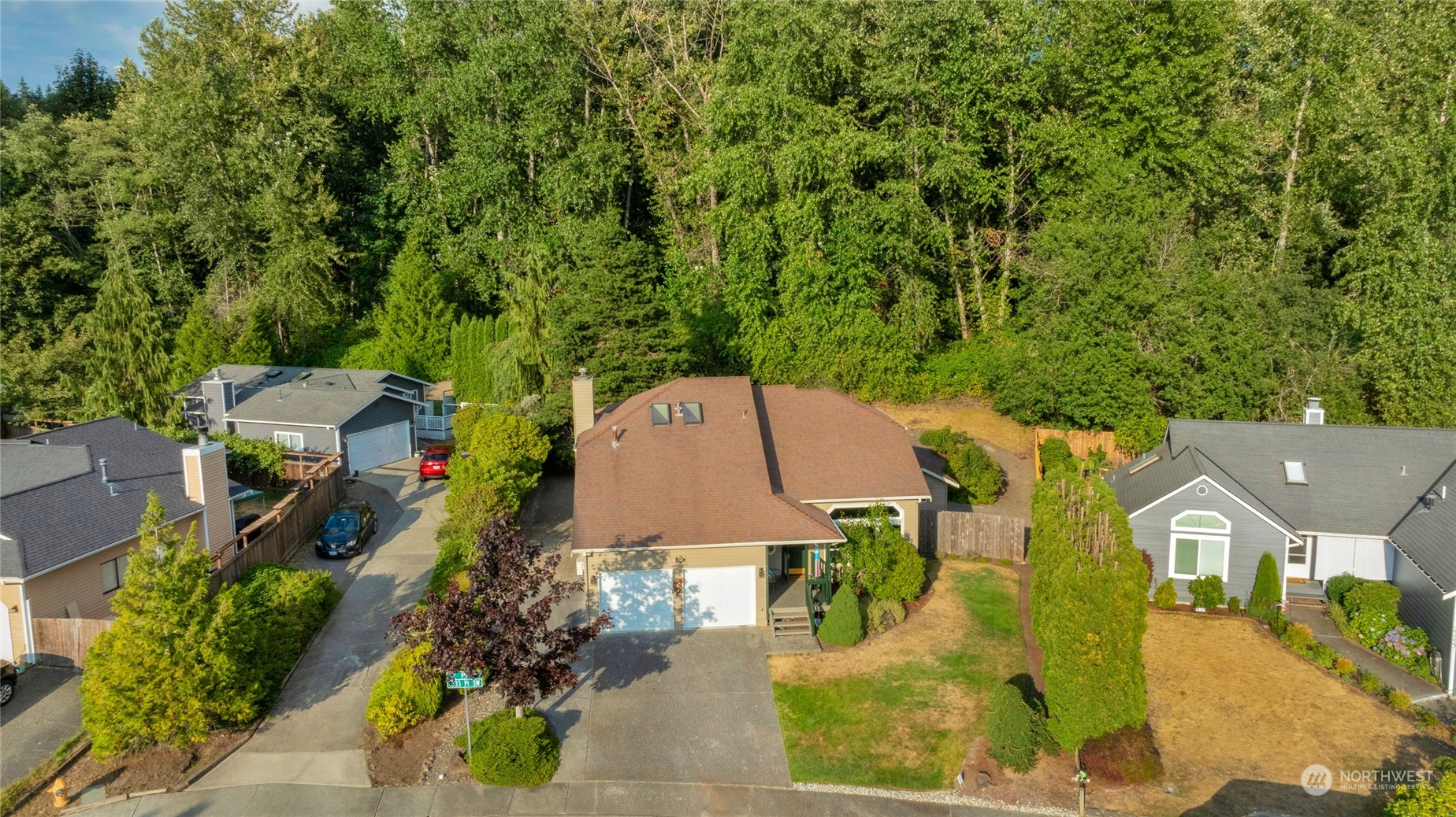 23323 12th Place West Bothell, WA 98021 - Photo 33 of 36 an aerial view of a house with a yard swimming pool a patio and yard