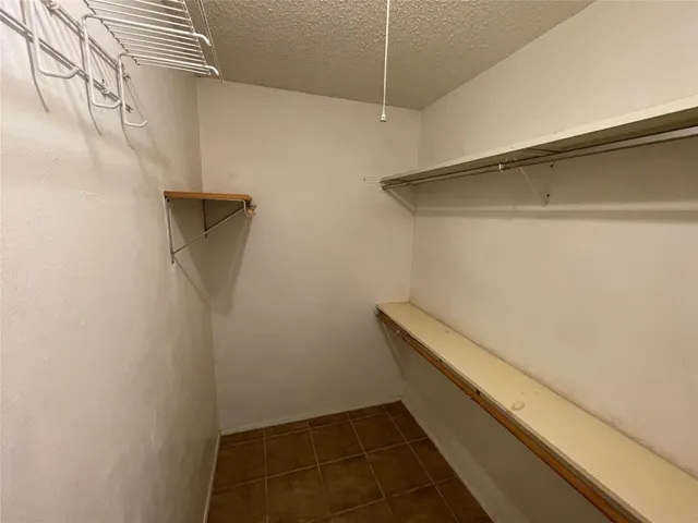a hallway with washer and dryer