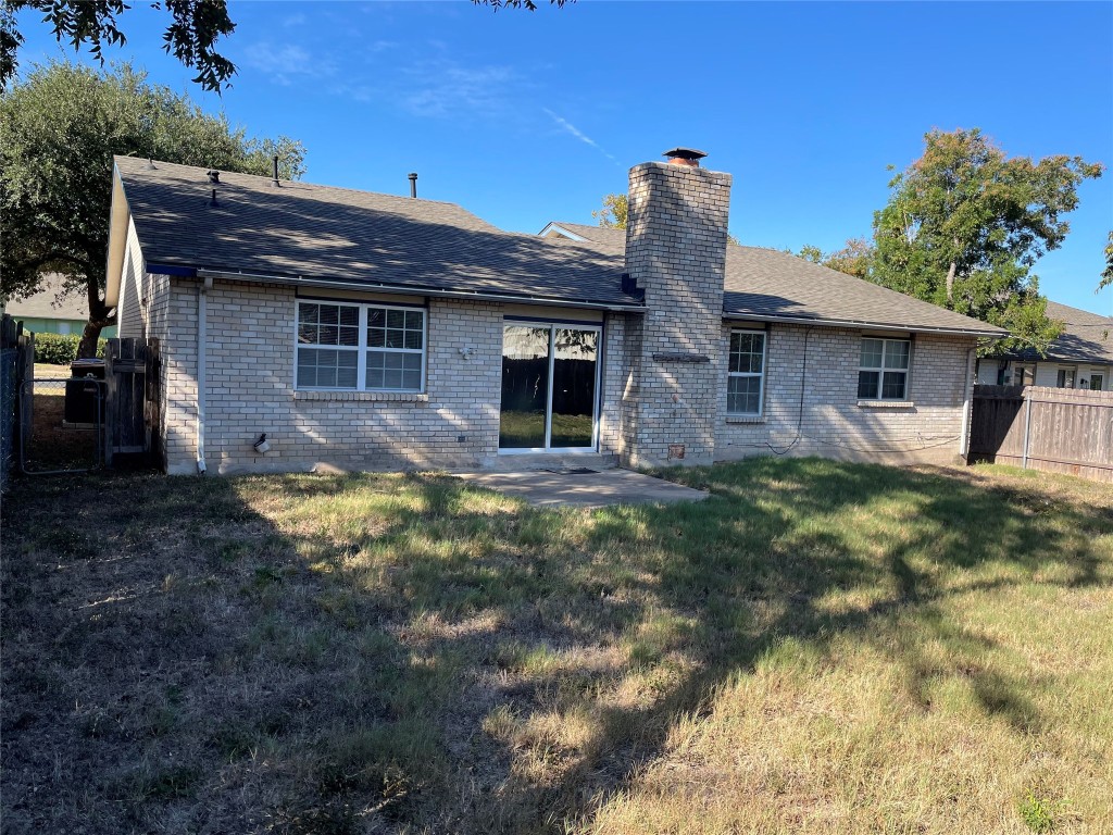 12013 Swallow Drive Austin, TX 78750 - Photo 24 of 25 a view of house with a yard
