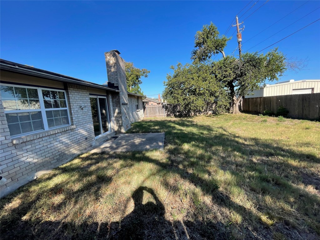 12013 Swallow Drive Austin, TX 78750 - Photo 25 of 25 a front view of a house with a yard