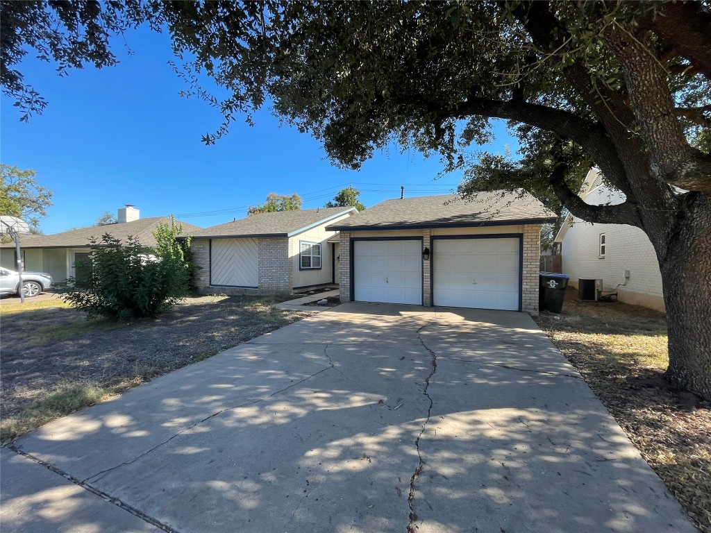 12013 Swallow Drive Austin, TX 78750 - Photo 3 of 25 a view of a house with a yard
