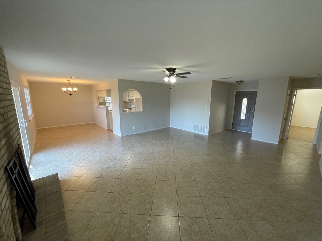 12013 Swallow Drive Austin, TX 78750 - Photo 8 of 25 a view of livingroom and hallway with wooden floor