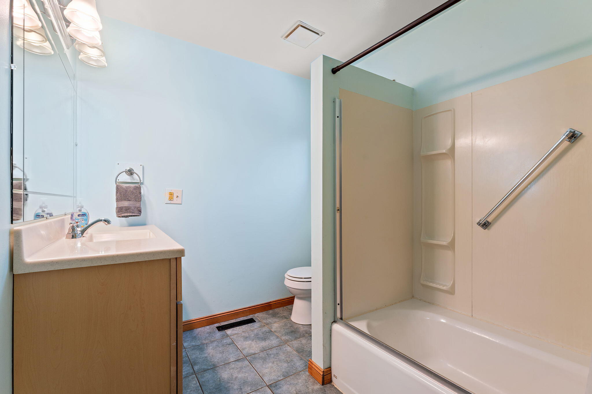 225 Warren Road Michigan City, IN 46360 - Photo 15 of 47 a bathroom with a sink toilet and shower