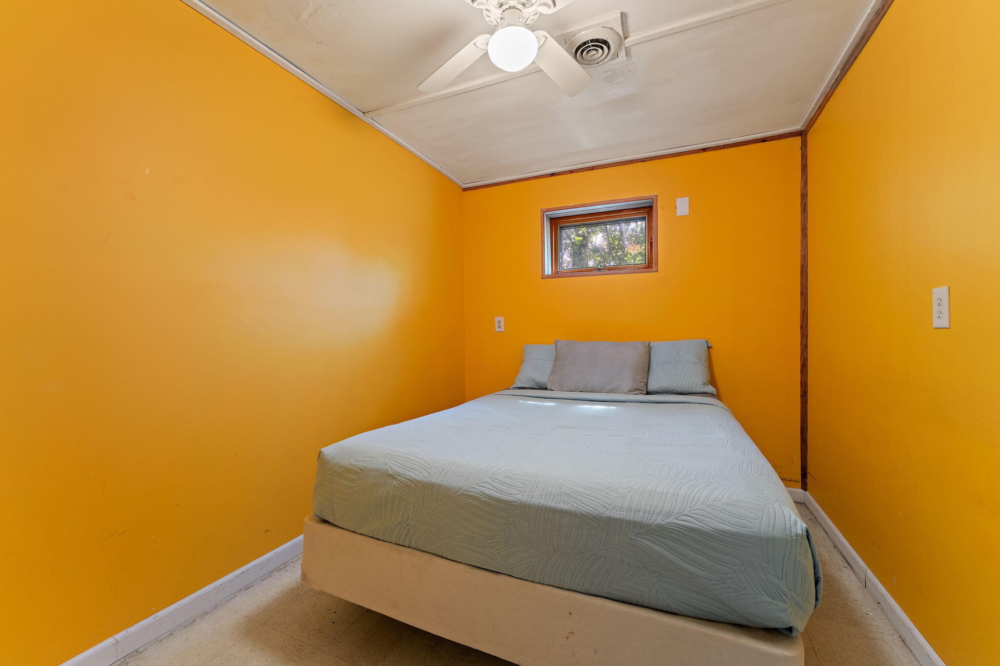 225 Warren Road Michigan City, IN 46360 - Photo 25 of 47 a bedroom with a bed and a wall painting