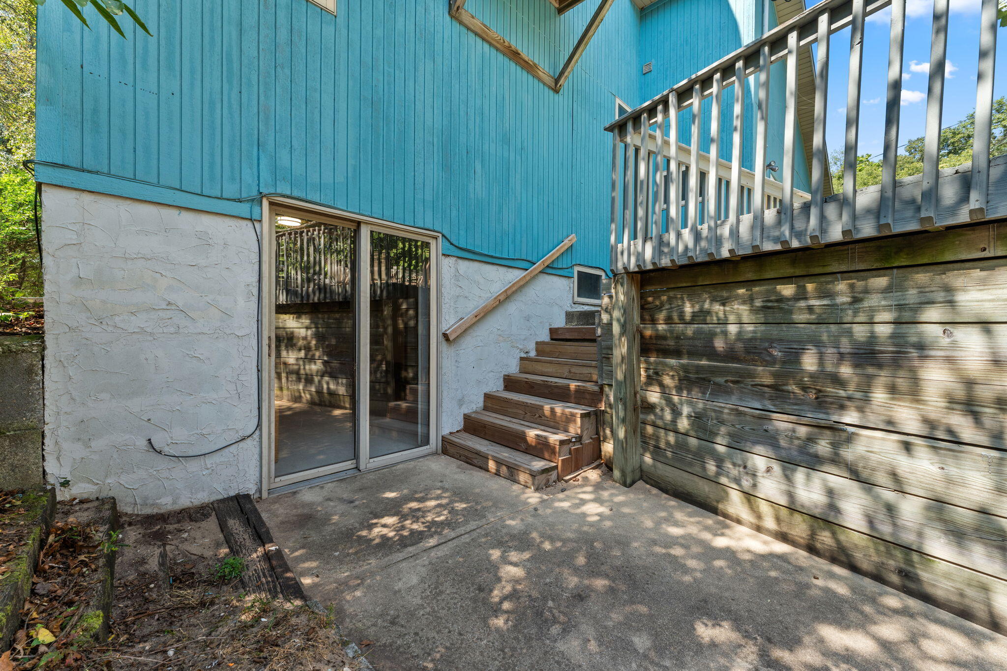 225 Warren Road Michigan City, IN 46360 - Photo 34 of 47 a view of a balcony with wooden floor and stairs