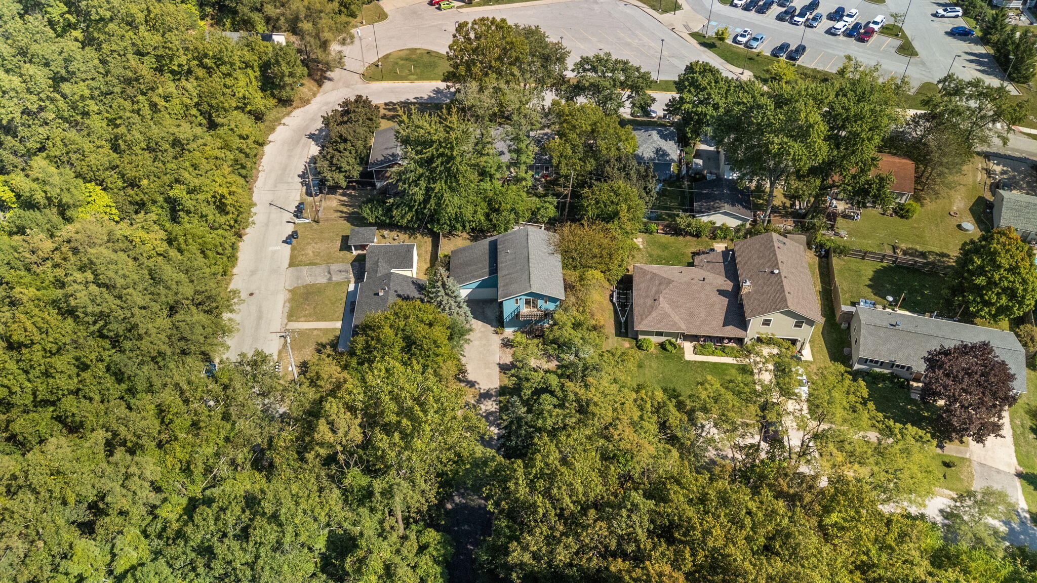 225 Warren Road Michigan City, IN 46360 - Photo 38 of 47 an aerial view of residential house with outdoor space and trees all around
