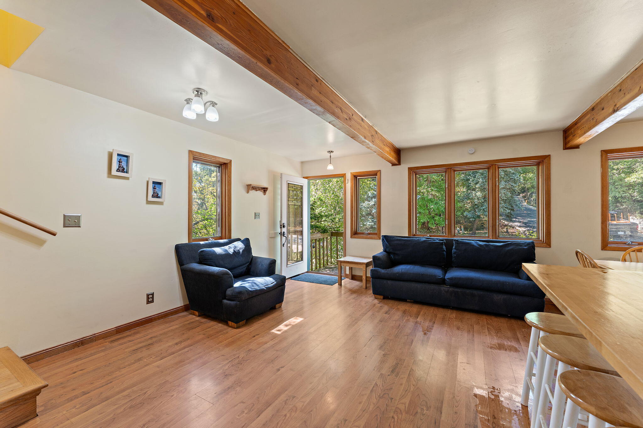 225 Warren Road Michigan City, IN 46360 - Photo 9 of 47 a living room with furniture and a large window