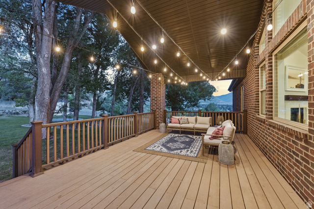 441 South 2080th Street East Springville, UT 84663 - Photo 45 of 64 Expansive covered patio featuring wood-finish decking and wood railings