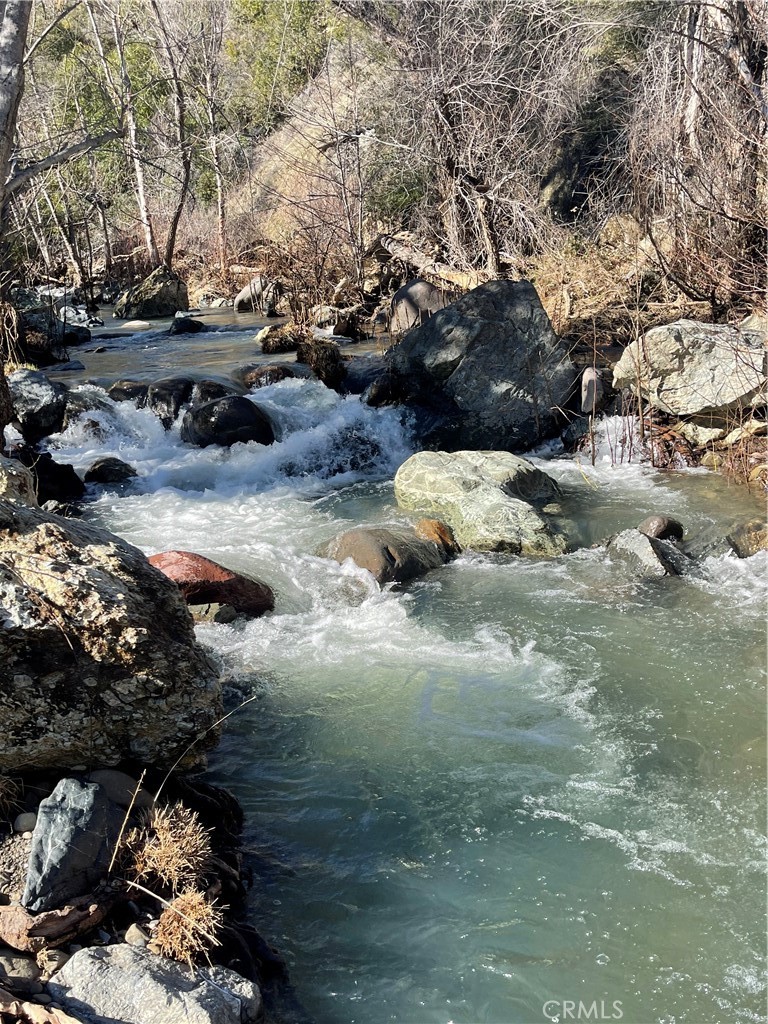 14700 Big Canyon Road Middletown, CA 95461 - Photo 2 of 7 a view of a fire pit with large trees