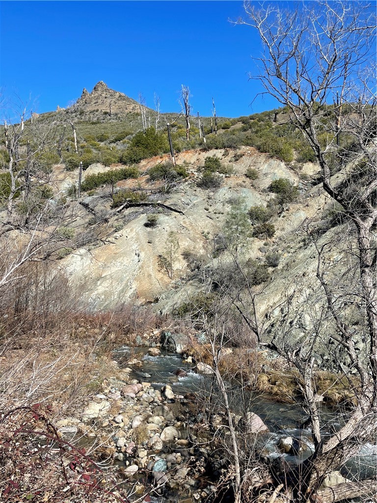 14700 Big Canyon Road Middletown, CA 95461 - Photo 6 of 7 a view of a large building with trees in the background