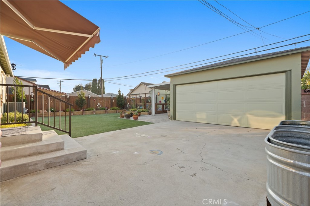 4559 Levelside Avenue Lakewood, CA 90712 - Photo 21 of 32 a view of a house with backyard and road