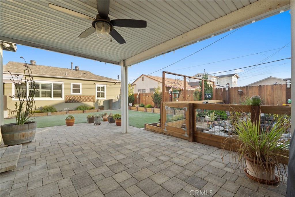 4559 Levelside Avenue Lakewood, CA 90712 - Photo 24 of 32 a view of a patio with table and chairs potted plants