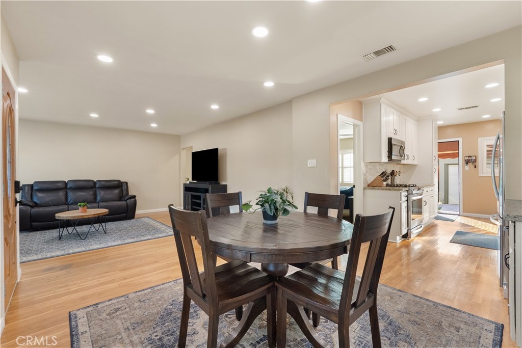 4559 Levelside Avenue Lakewood, CA 90712 - Photo 6 of 32 a view of a dining room with furniture
