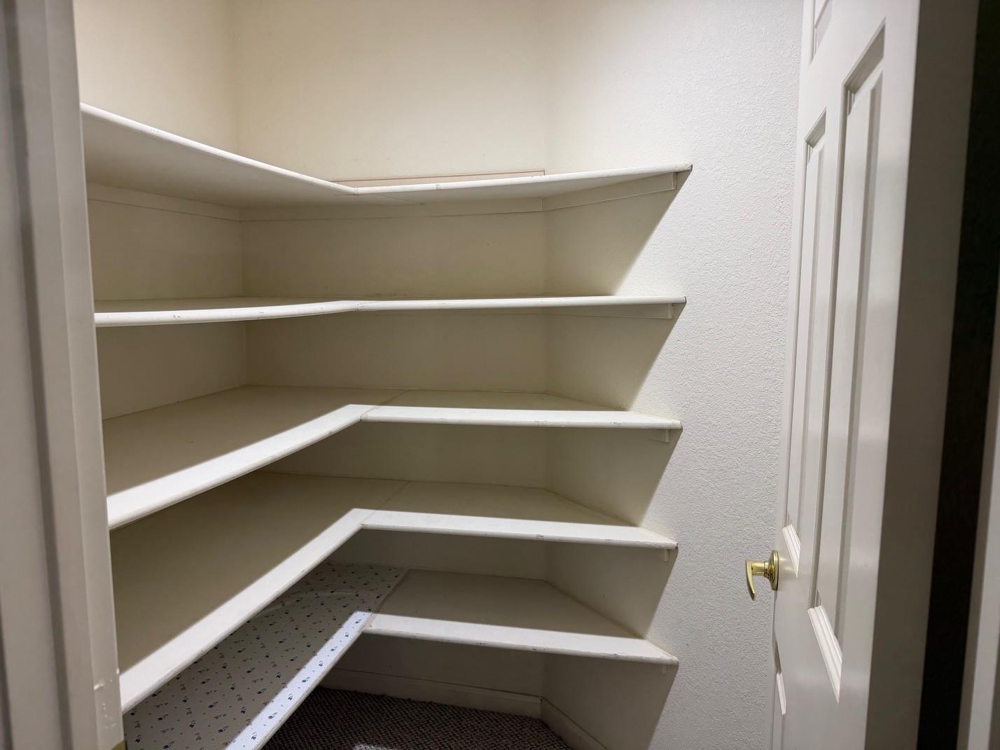 5417 Ridgewood Drive Fremont, CA 94555 - Photo 27 of 36 a view of walk in closet with empty racks