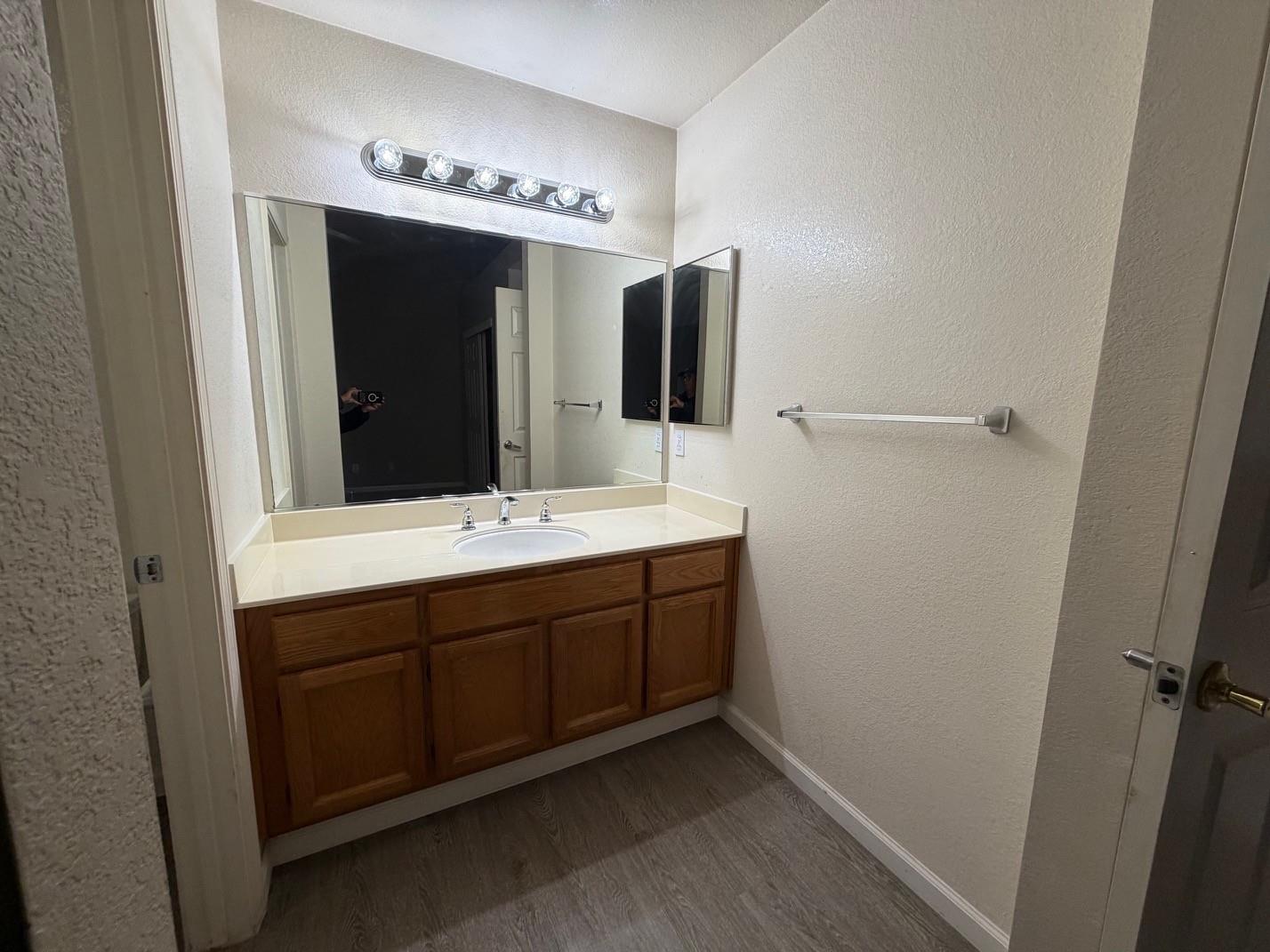 5417 Ridgewood Drive Fremont, CA 94555 - Photo 30 of 36 a bathroom with a double vanity sink and mirror