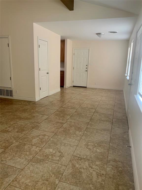 2302 Mesquite Lane, Unit A Georgetown, TX 78628 - Photo 4 of 11 Unfurnished room featuring baseboards
