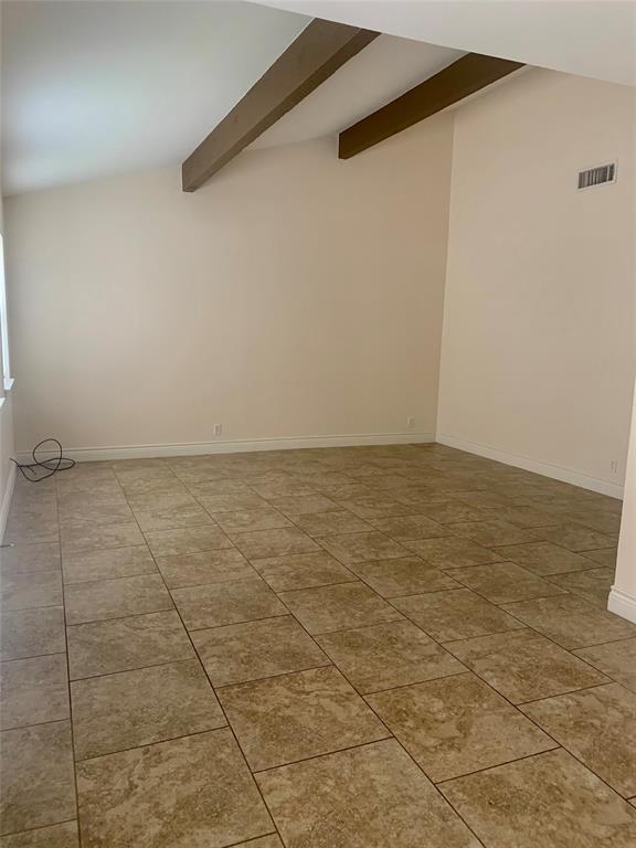 2302 Mesquite Lane, Unit A Georgetown, TX 78628 - Photo 5 of 11 Empty room featuring baseboards