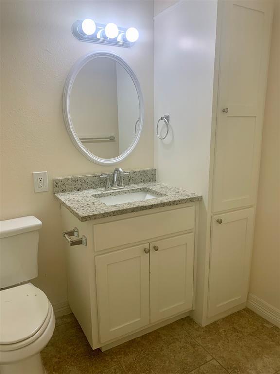 2302 Mesquite Lane, Unit A Georgetown, TX 78628 - Photo 7 of 11 Bathroom with vanity and light tile patterned floors
