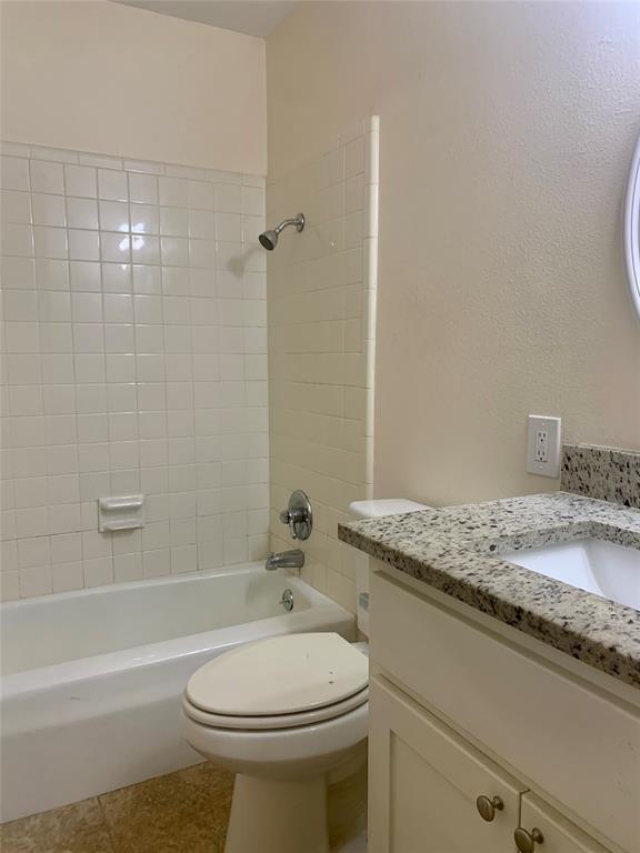 2302 Mesquite Lane, Unit A Georgetown, TX 78628 - Photo 8 of 11 Full bath with vanity, tub / shower combination, and tile patterned floors