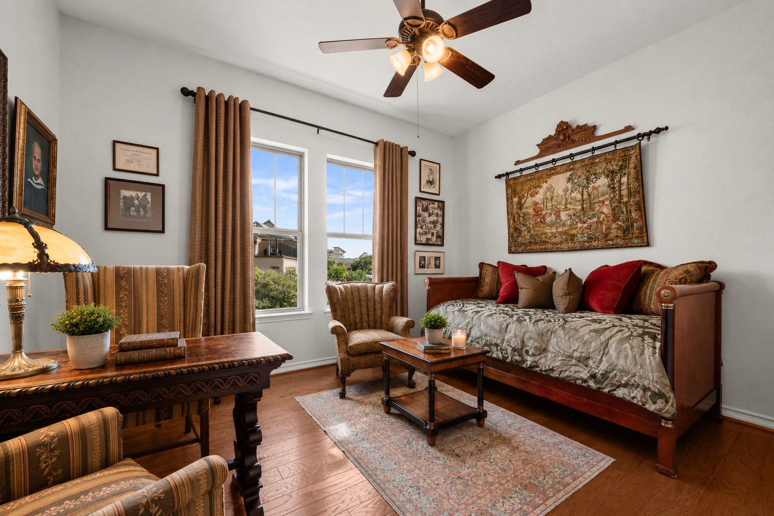 204 Adams Street Georgetown, TX 78628 - Photo 25 of 33 Warm wood tones and rich textiles appoint this inviting study or bedroom.