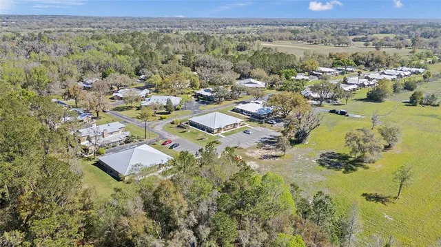 an aerial view of residential house with outdoor space