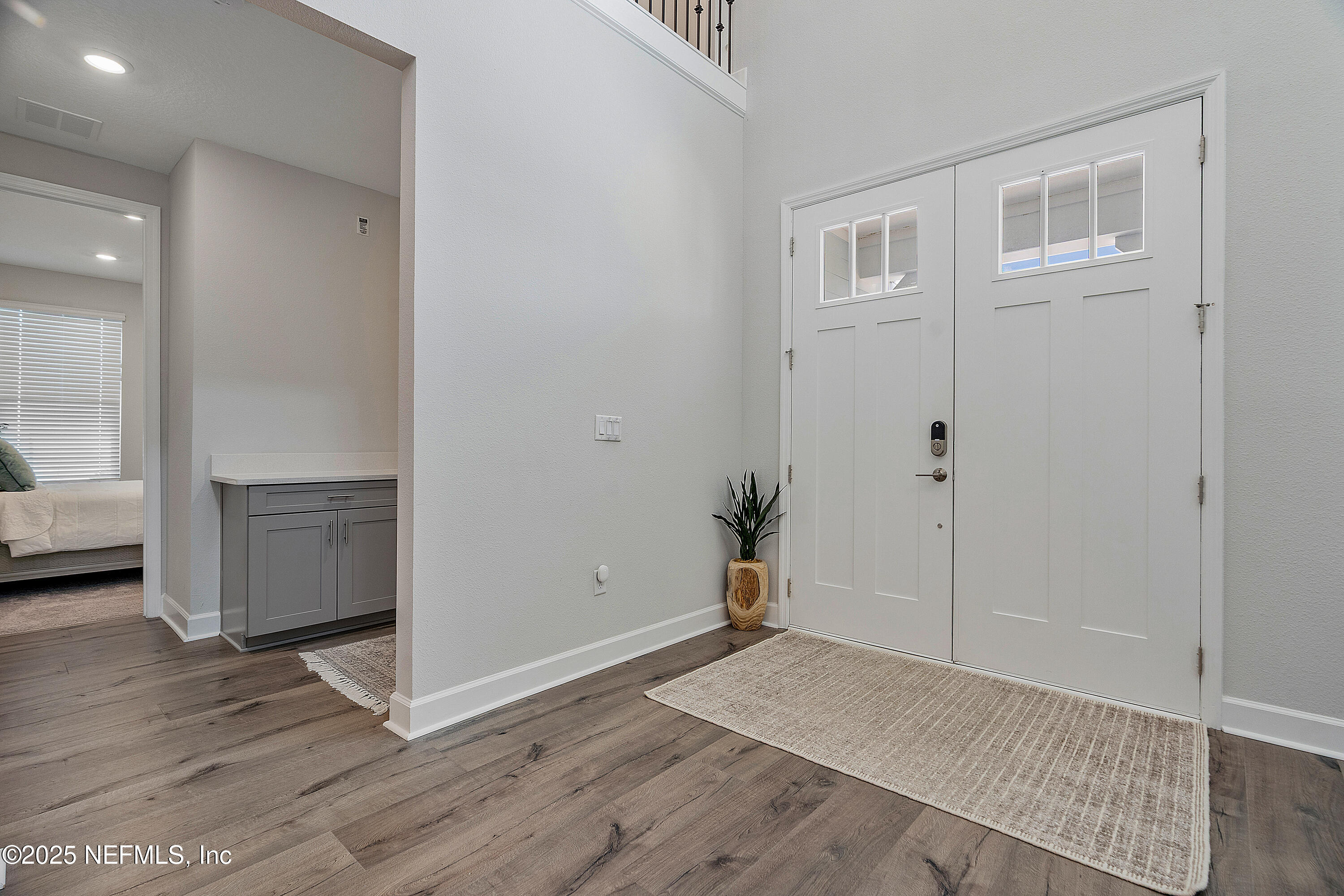 290 Marquesa Circle St. Johns, FL 32259 - Photo 17 of 107 an empty room with wooden floor and windows