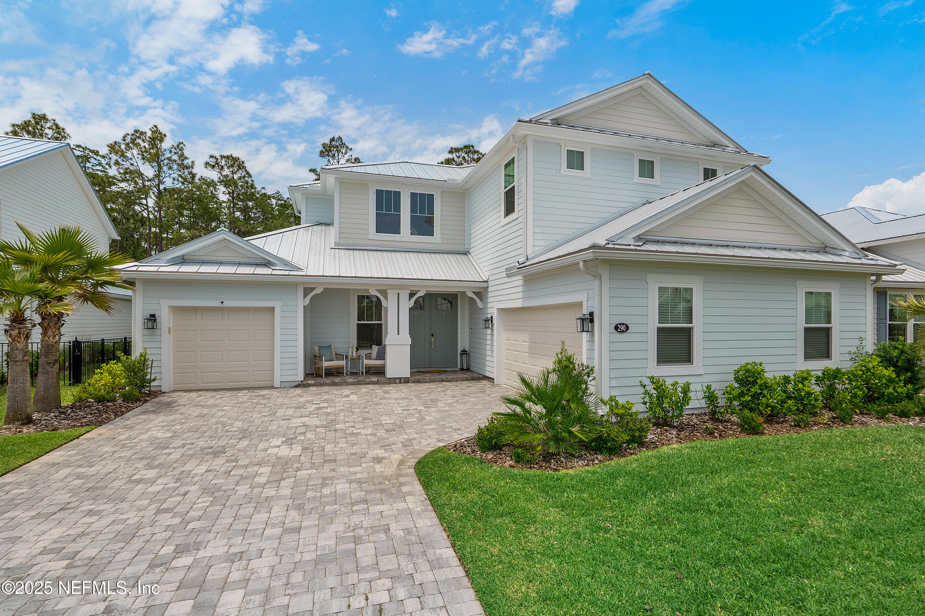 290 Marquesa Circle St. Johns, FL 32259 - Photo 2 of 107 a front view of a house with a garden and yard