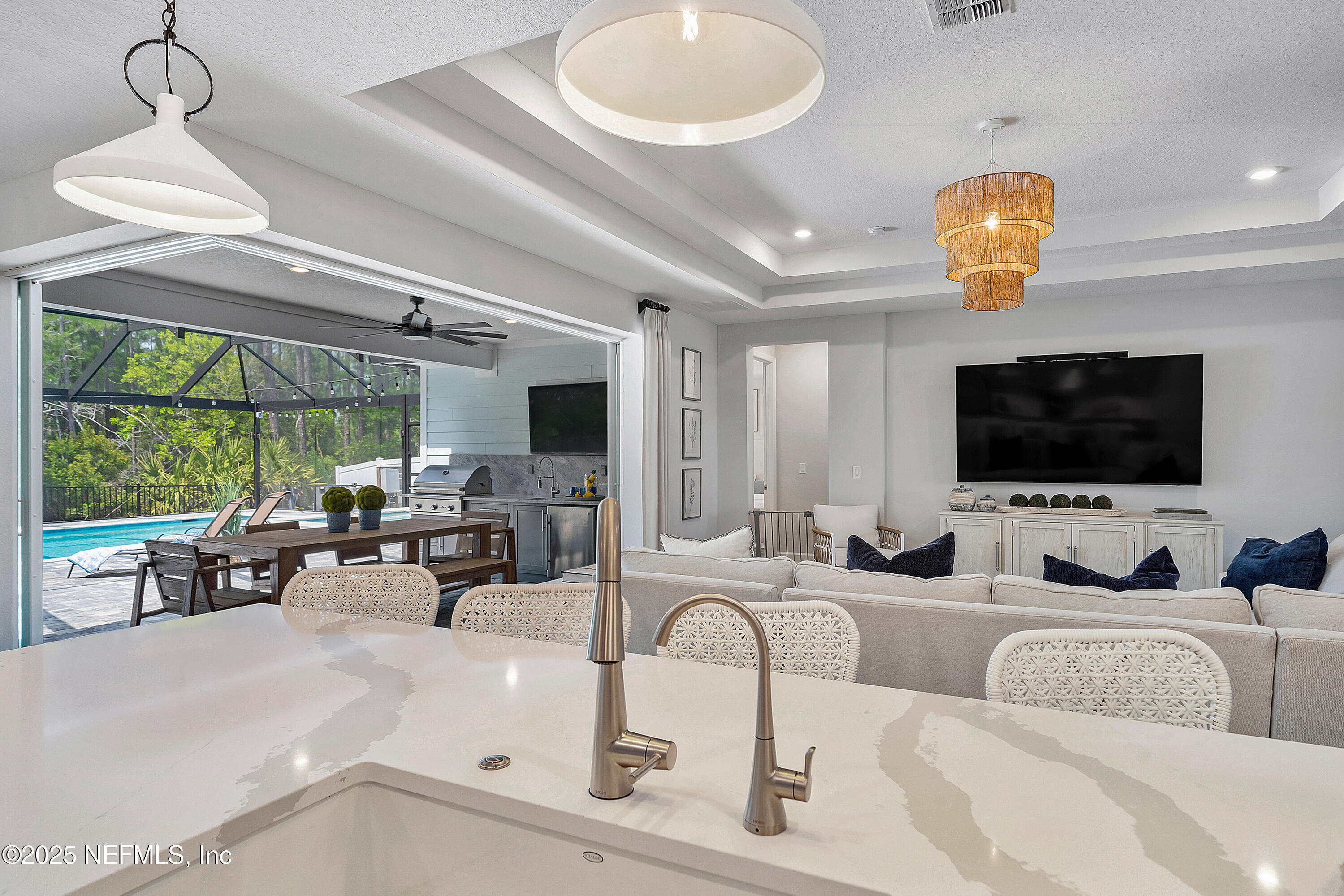 290 Marquesa Circle St. Johns, FL 32259 - Photo 32 of 107 a living room with furniture and a flat screen tv