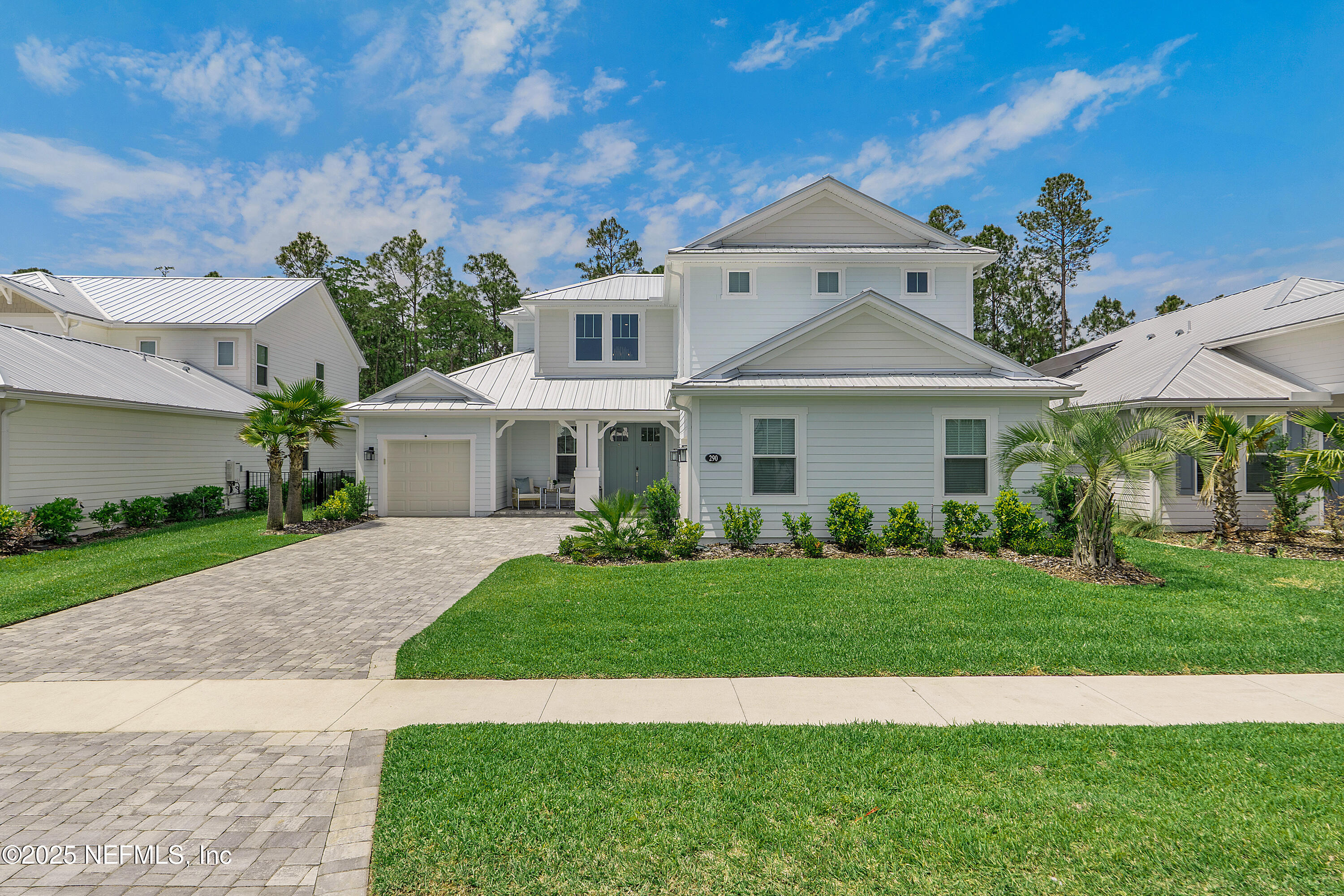 290 Marquesa Circle St. Johns, FL 32259 - Photo 4 of 107 a front view of a house with a yard