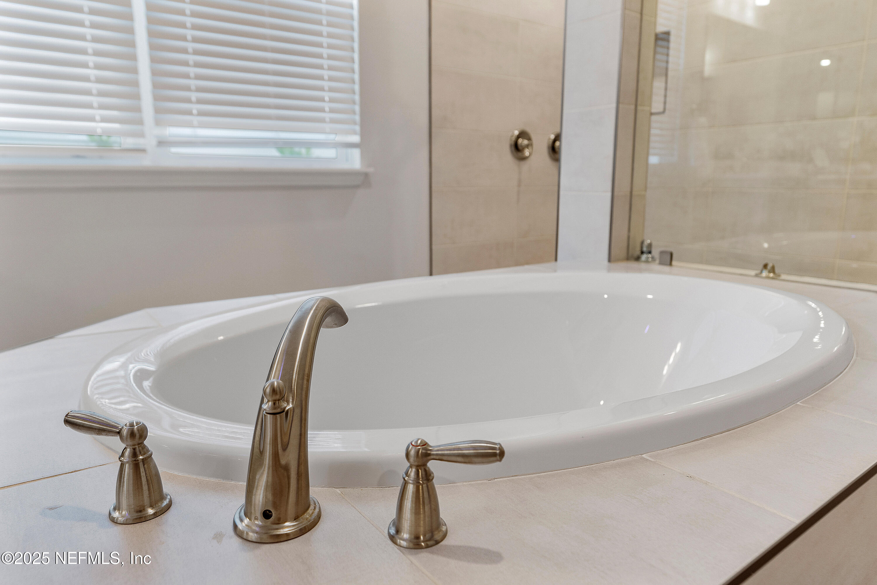 290 Marquesa Circle St. Johns, FL 32259 - Photo 46 of 107 a bath tub sitting next to a window