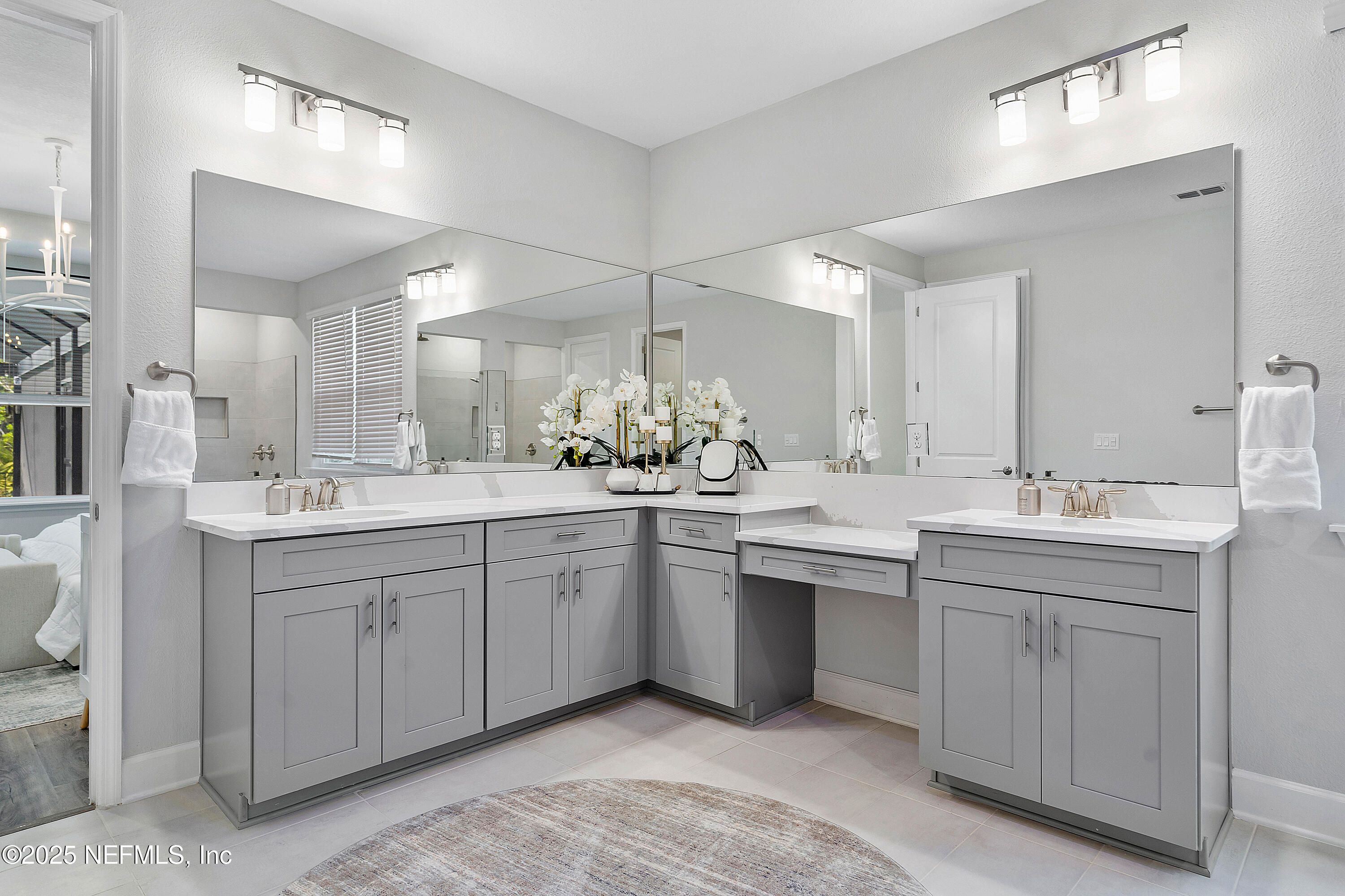 290 Marquesa Circle St. Johns, FL 32259 - Photo 47 of 107 a bathroom with a sink double vanity and a mirror