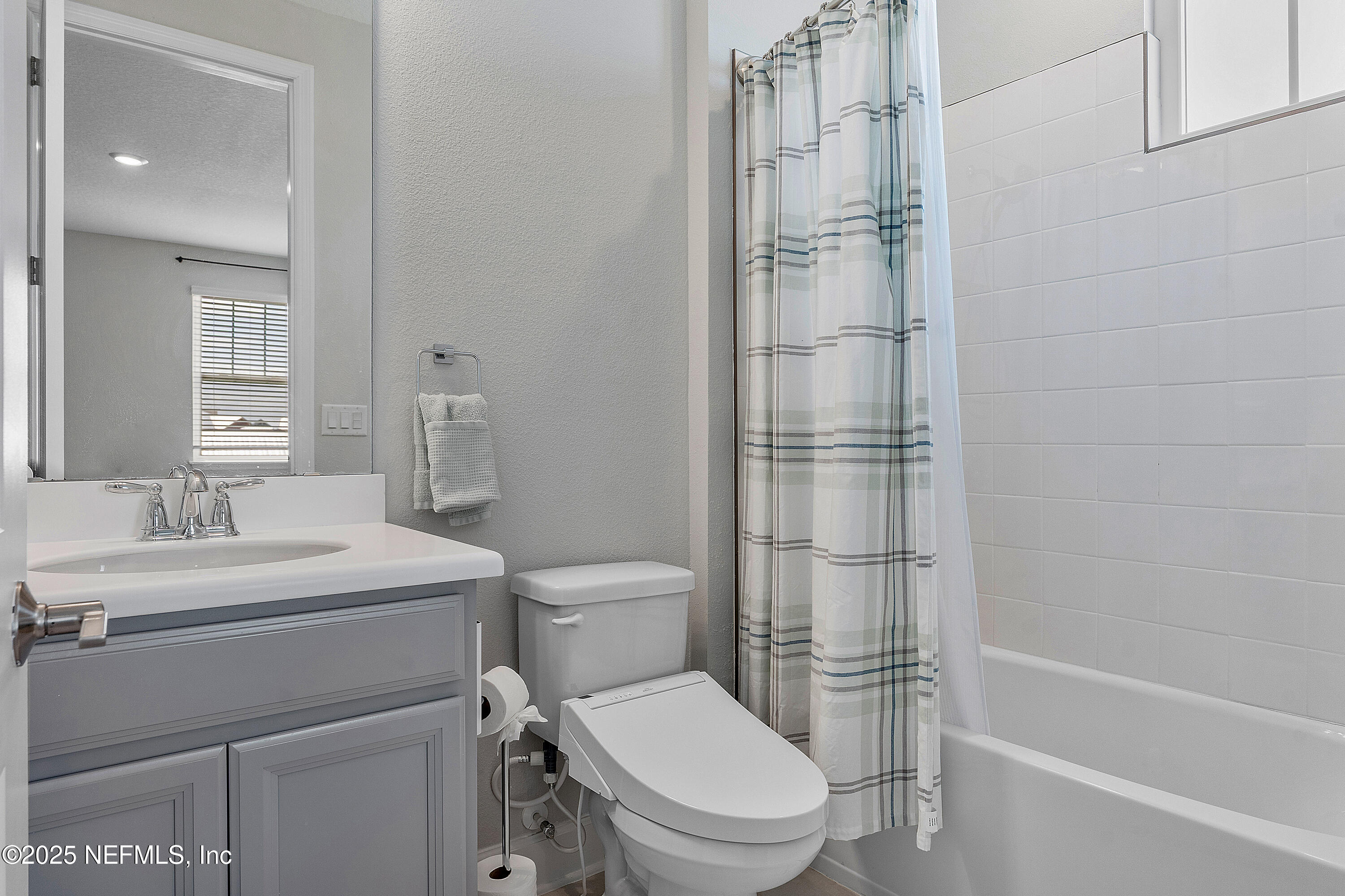 290 Marquesa Circle St. Johns, FL 32259 - Photo 63 of 107 a bathroom with a shower a toilet and sink