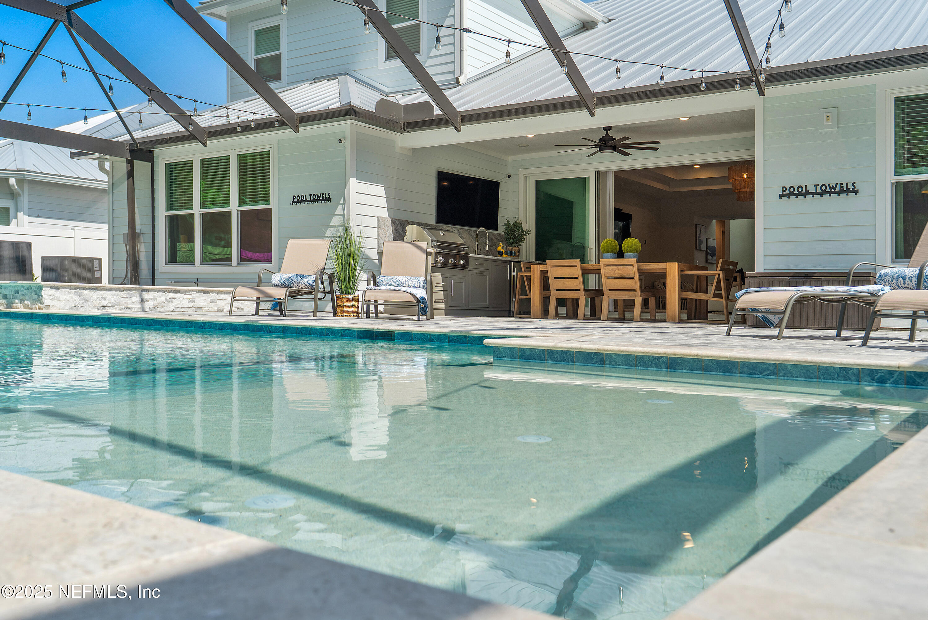 290 Marquesa Circle St. Johns, FL 32259 - Photo 81 of 107 a view of a swimming pool with a patio