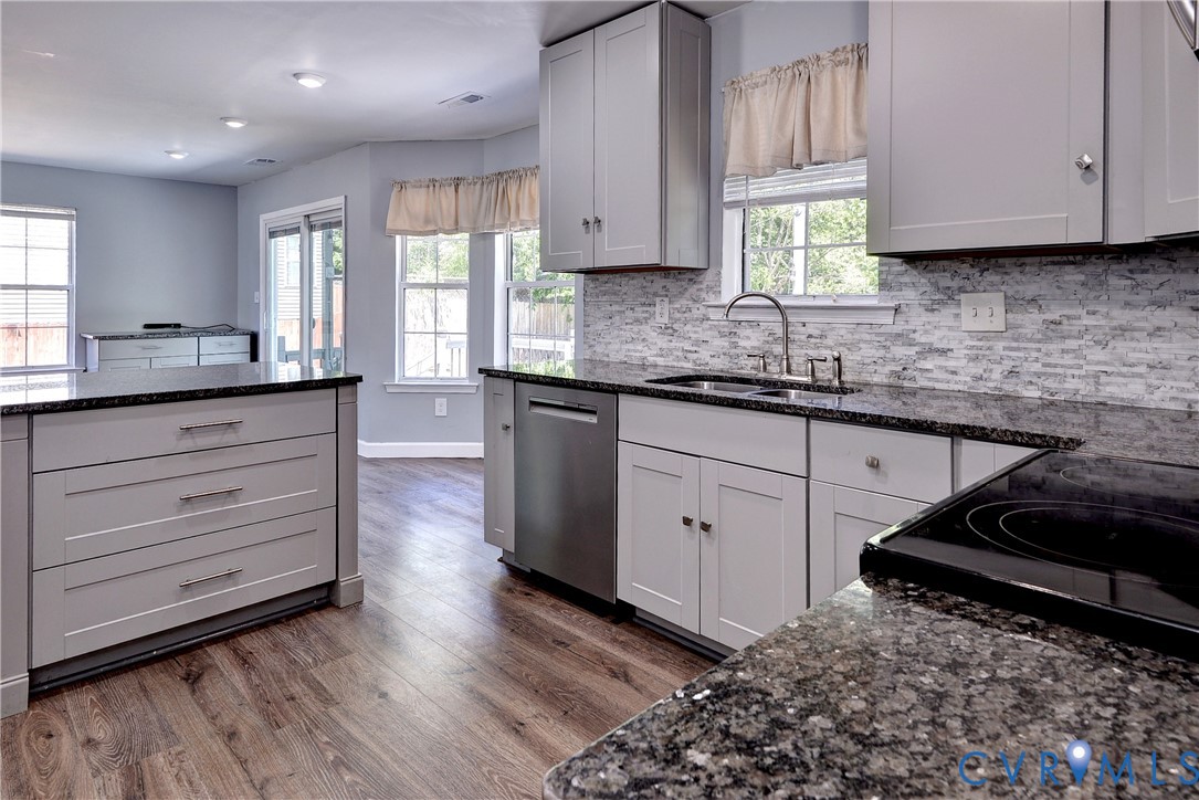 5912 Allegheny Road Williamsburg, VA 23188 - Photo 13 of 38 Updated Kitchen in 2023 with LVP, quartz and stain
